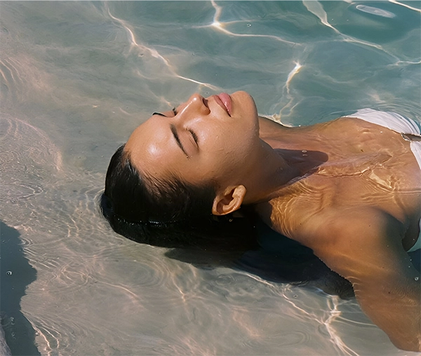 woman taking a nap on the beach